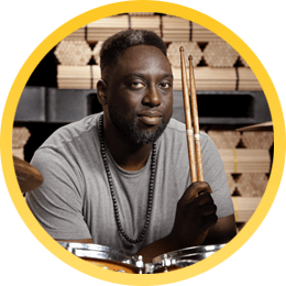 Larnell Lewis playing with Promark Drumsticks