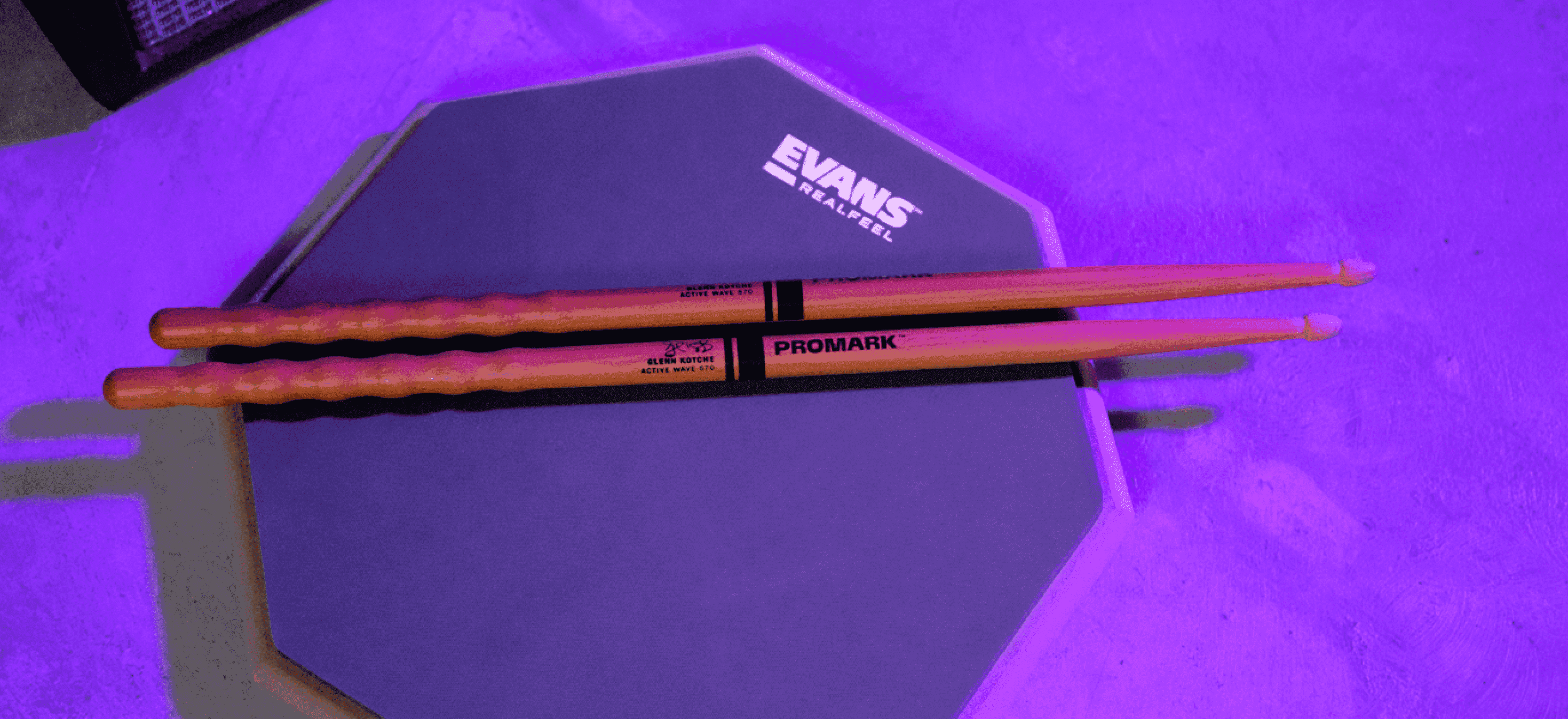 Evans Real Feel Practice Pad and ProMark drumsticks