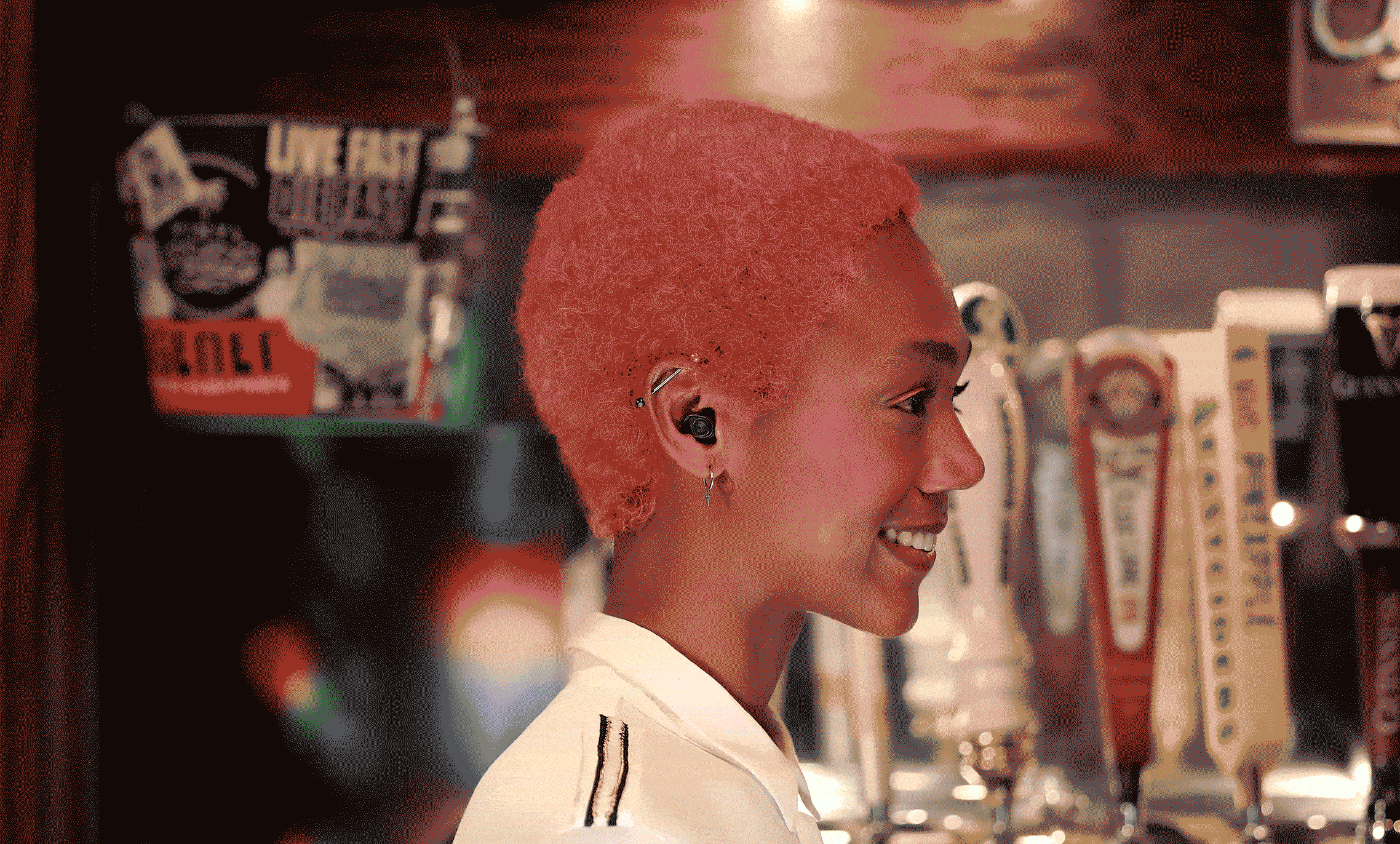 Different people with ear plugs in.