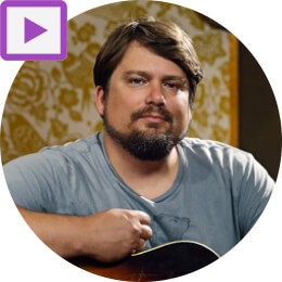 Sean Watkins with guitar