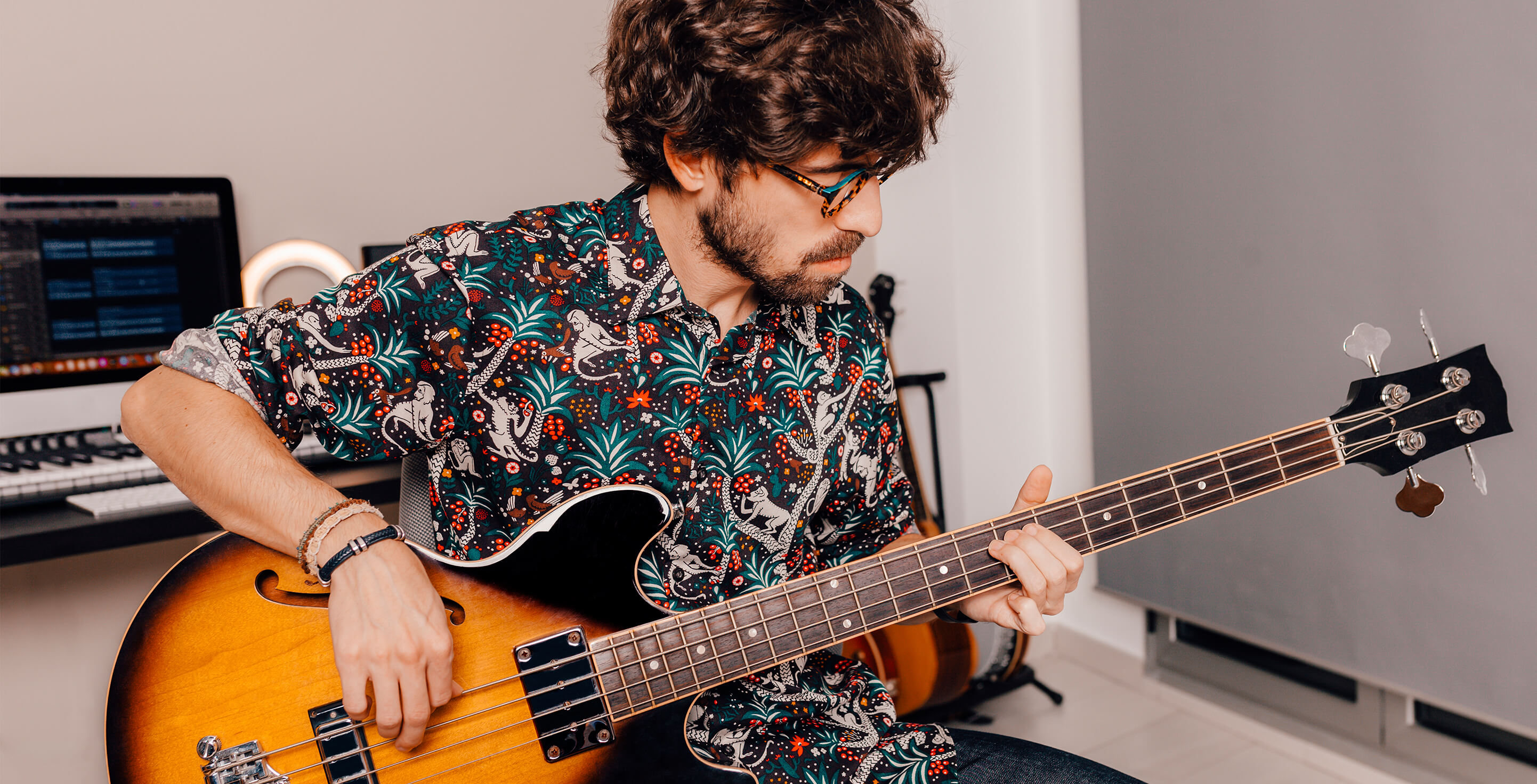 Person playing bass guitar