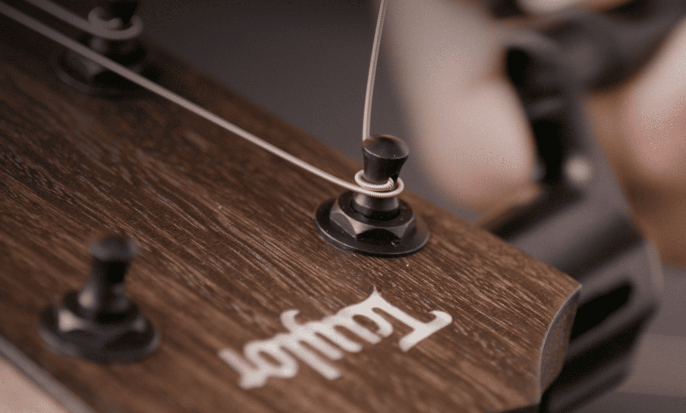 How to restring an acoustic guitar