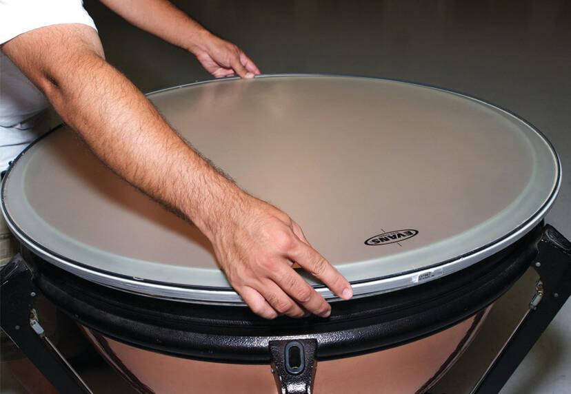 Person touching Timpani 