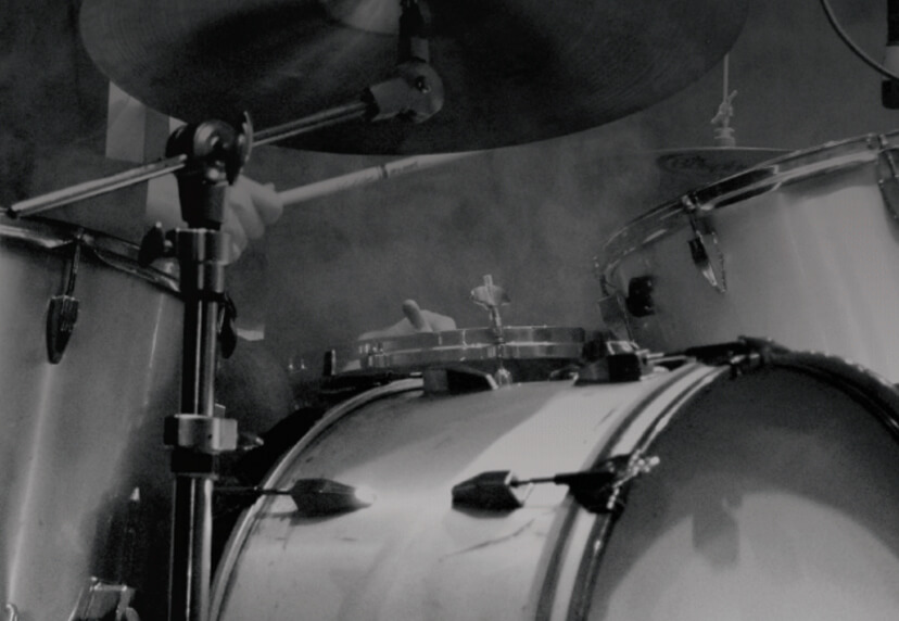 Person playing drumset