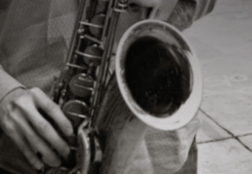 Person playing saxophone