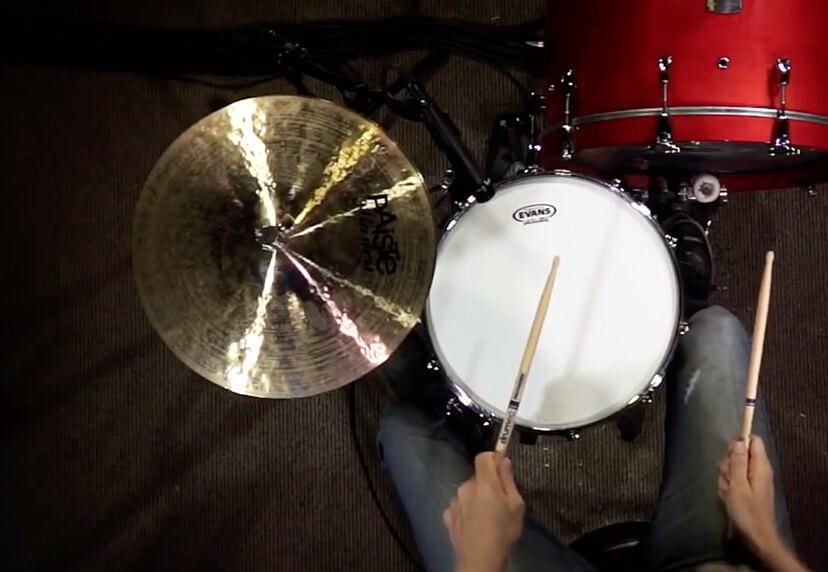 Person playing drumset