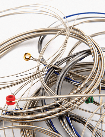 Guitar strings being recycled