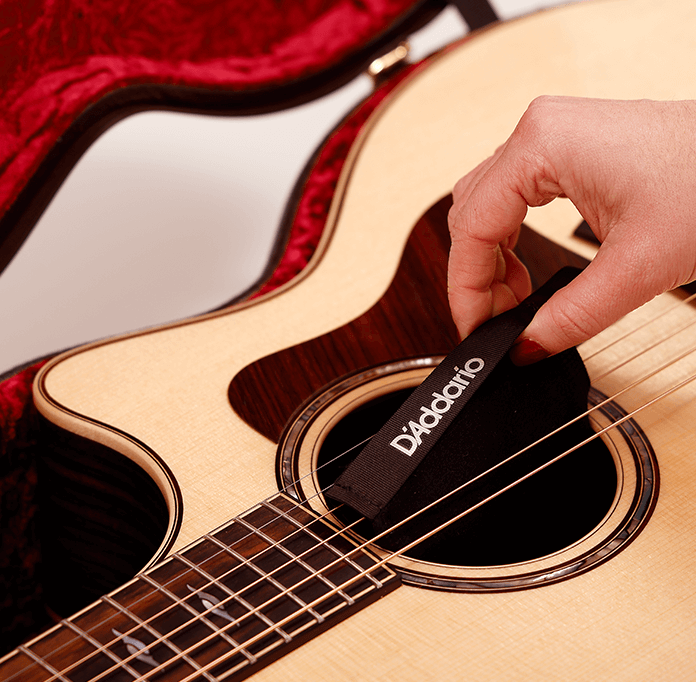 Humidipak humidity control in acoustic guitar